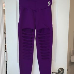 Purple ripped leggings